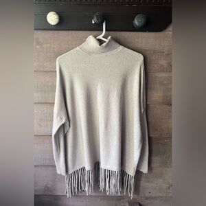 Turtleneck sweater with fringe bottom, super soft, bat sleeves, neutral color